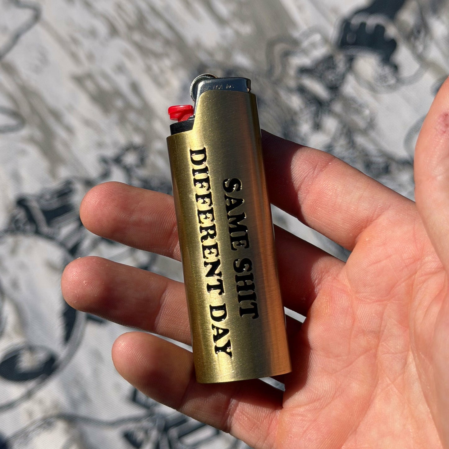 Same Shit Different Day Lighter Cover (Gold) - Ripndip